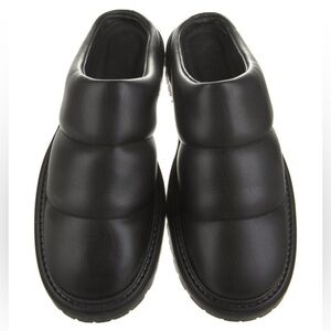Staud black vegan leather lug soled mules